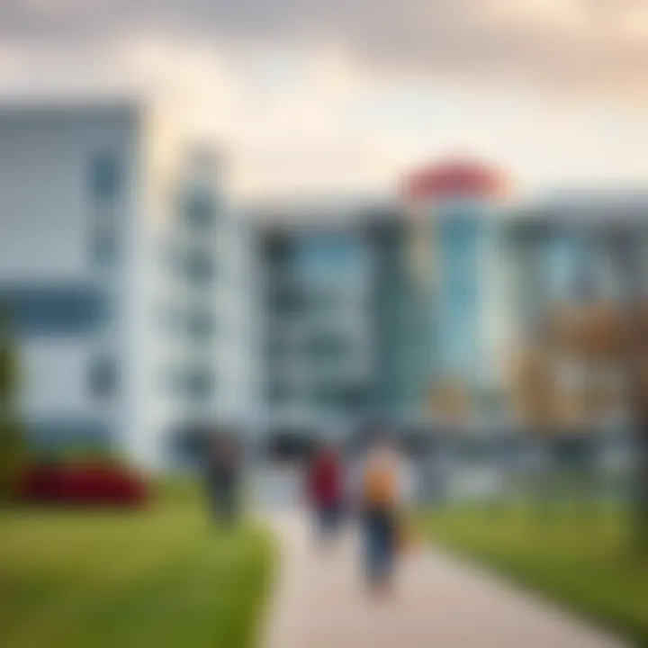 Modern university campus building with students walking on pathways