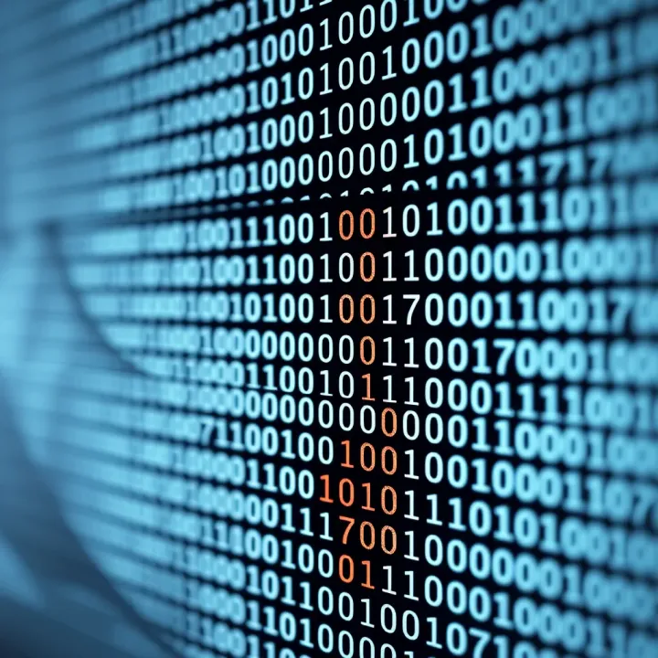 Close-up view of binary code displayed clearly on a white background emphasizing digital data clarity